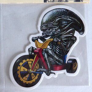 NEW ALIEN RIDING BIG WHEEL VINYL DECAL STICKER